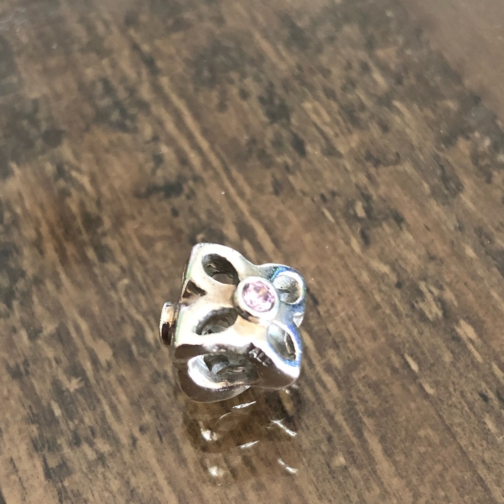 Pandora Charm 925 SS stamped ALE with pink stones on all 3 sides.